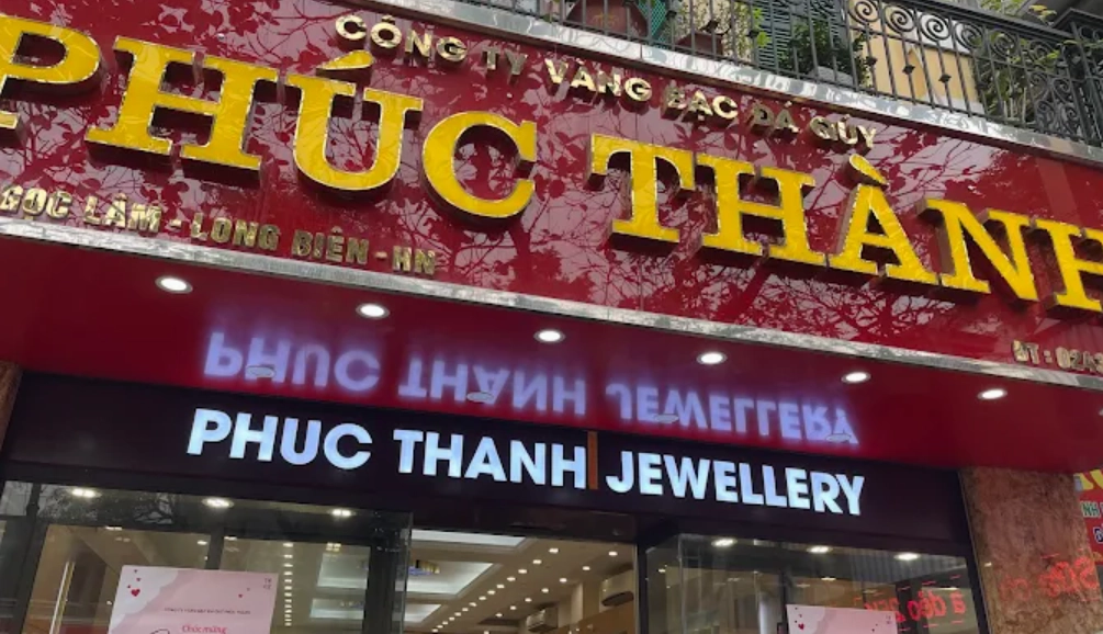 Biểu tượng vàng và biểu đồ giá